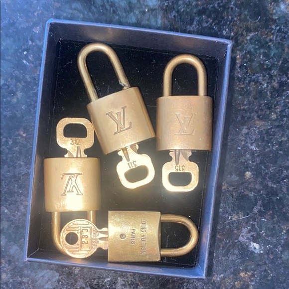 Louis Vuitton Accessories - Louis Vuitton Gold Padlock this is for 1 only